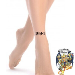 1994 - Numero tatuador na canela